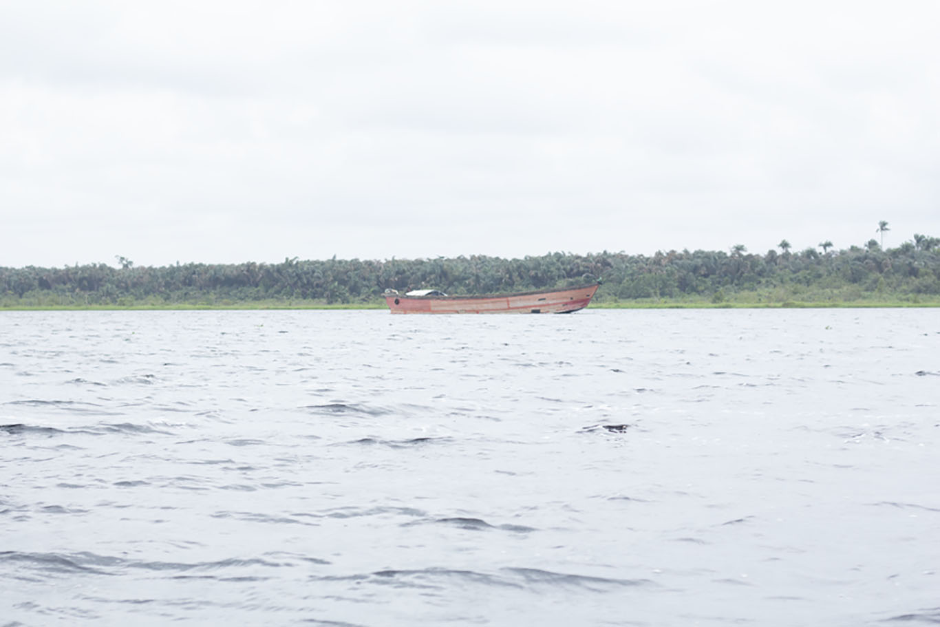 Ode -omi beach sandy shore and ocean waves in Ijebu, Nieria.